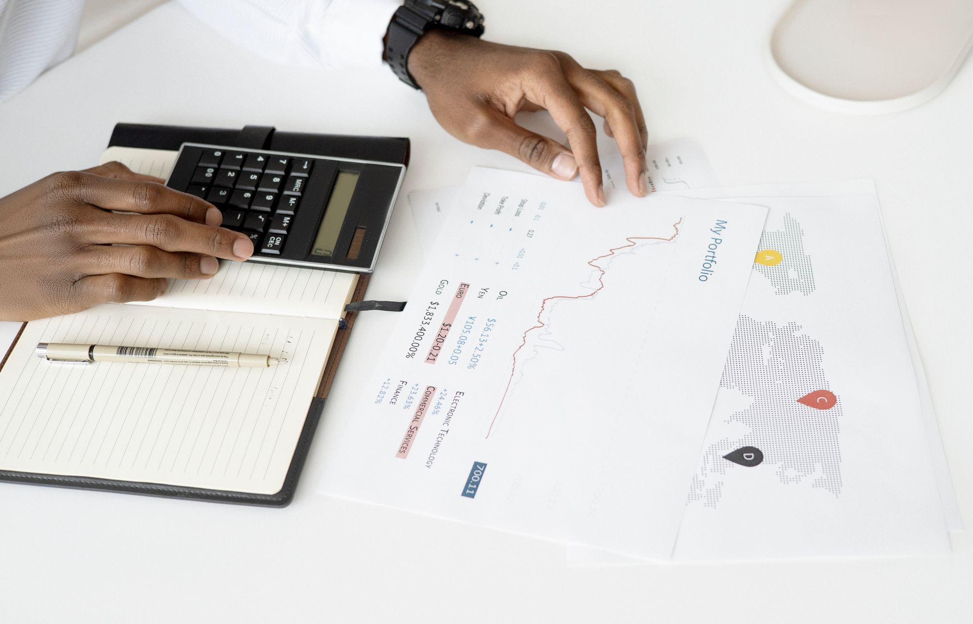 Person analysing investment documents and financial plan for FIRE